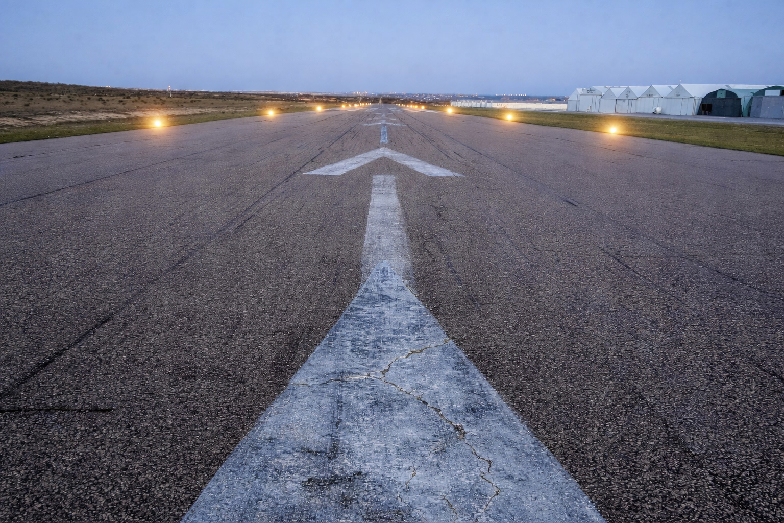 Runway centerline at dusk with edge lights